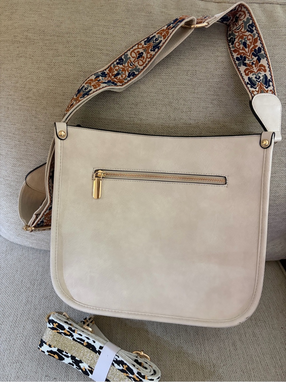 Cream Shoulder Bag with two Patterned Decorative Straps.